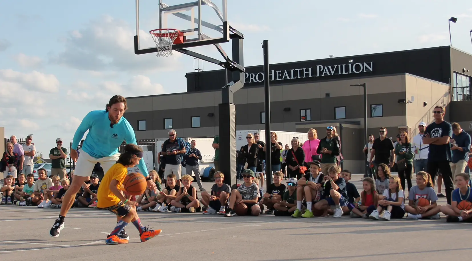 Connaughton teaches young kids basketball at Dockhounds Connaughton teaches young kids basketball at Dockhounds