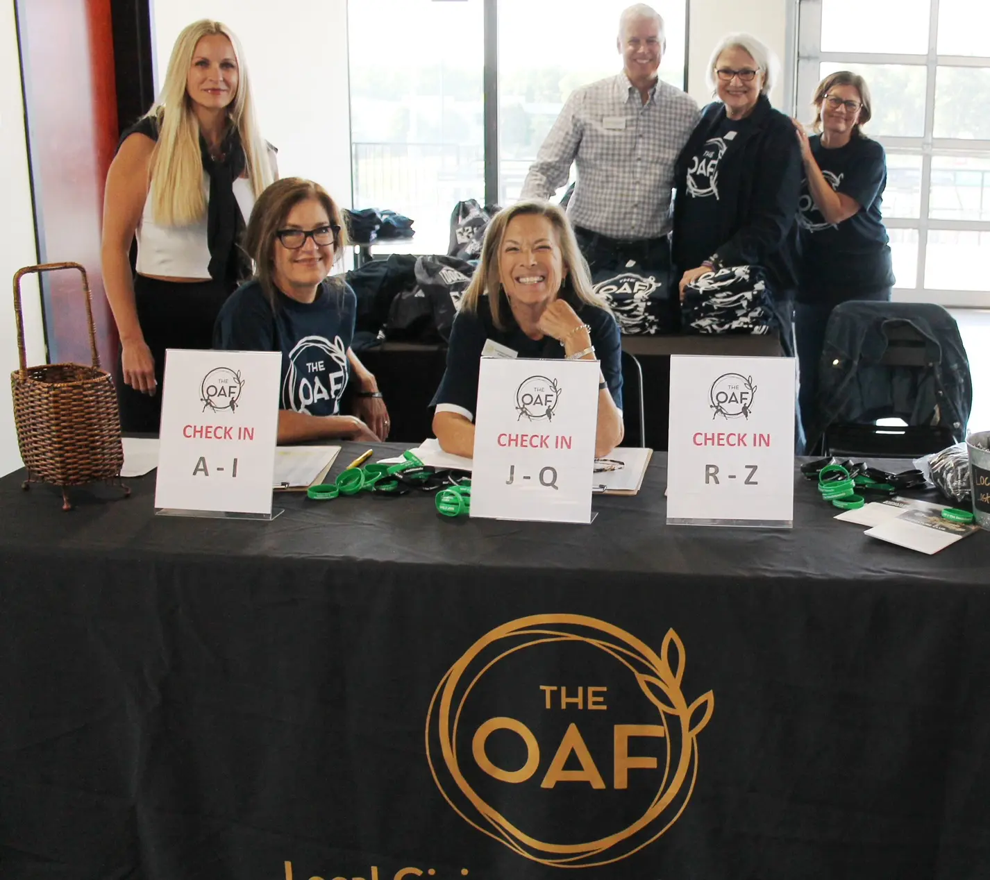 OAF staff helps with registration at basketball clinic OAF staff helps with registration at basketball clinic